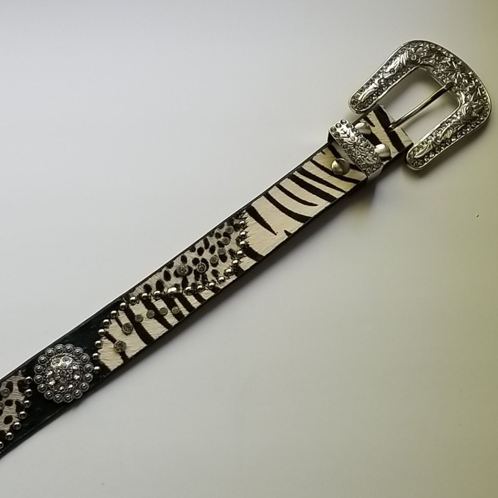 Genuine Leather and rhinestone belt.